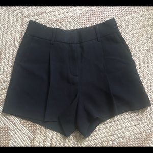 Judith & Charles high-waisted dress shorts.